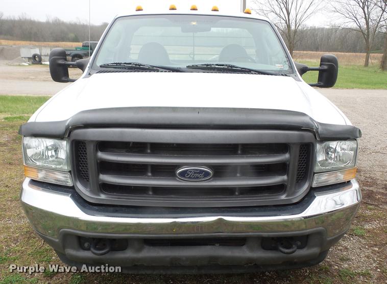 image for item DB0603 2004 Ford F350 Super Duty flatbed pickup truck