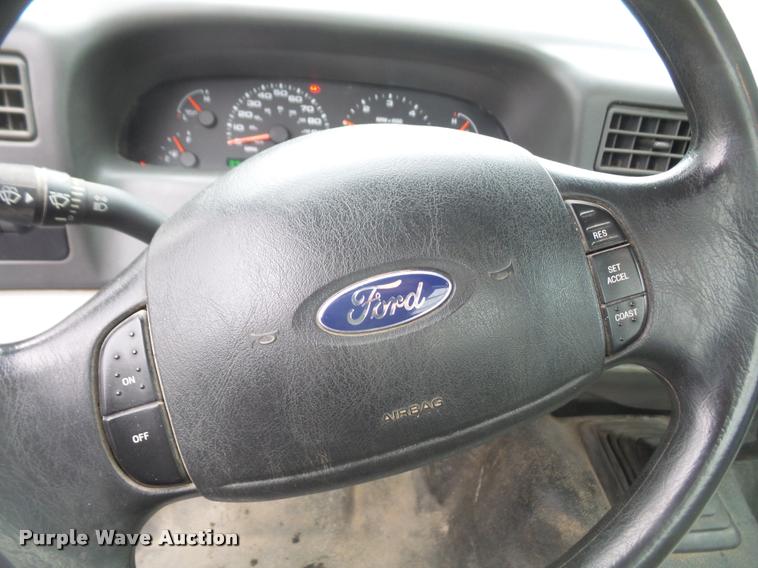 image for item DB0603 2004 Ford F350 Super Duty flatbed pickup truck