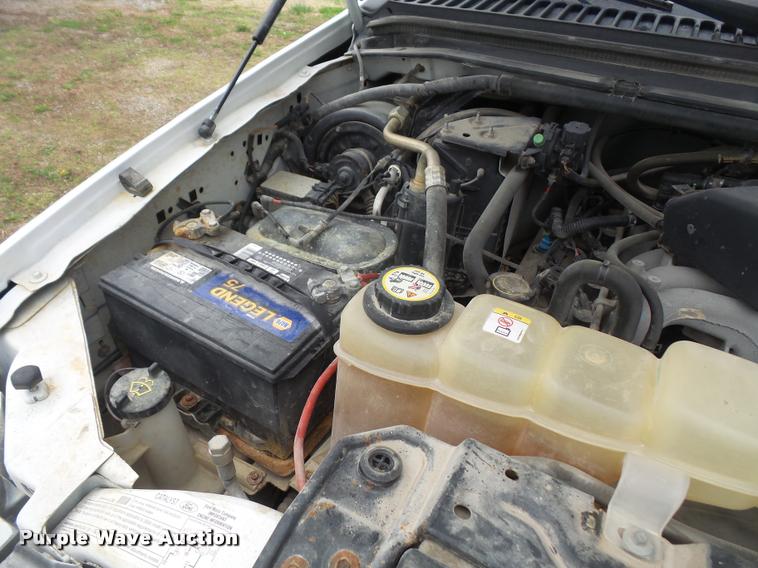 image for item DB0603 2004 Ford F350 Super Duty flatbed pickup truck