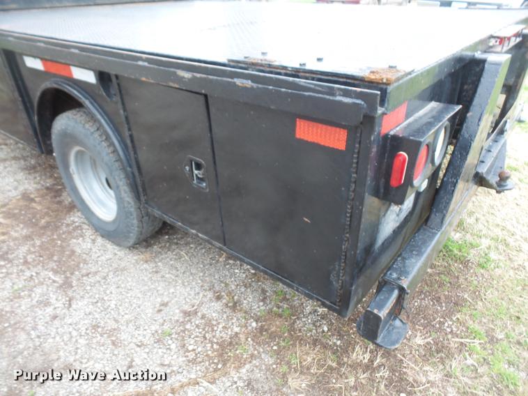 image for item DB0603 2004 Ford F350 Super Duty flatbed pickup truck