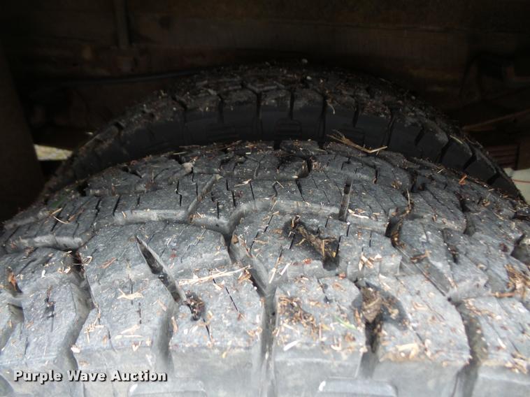 image for item DB0603 2004 Ford F350 Super Duty flatbed pickup truck