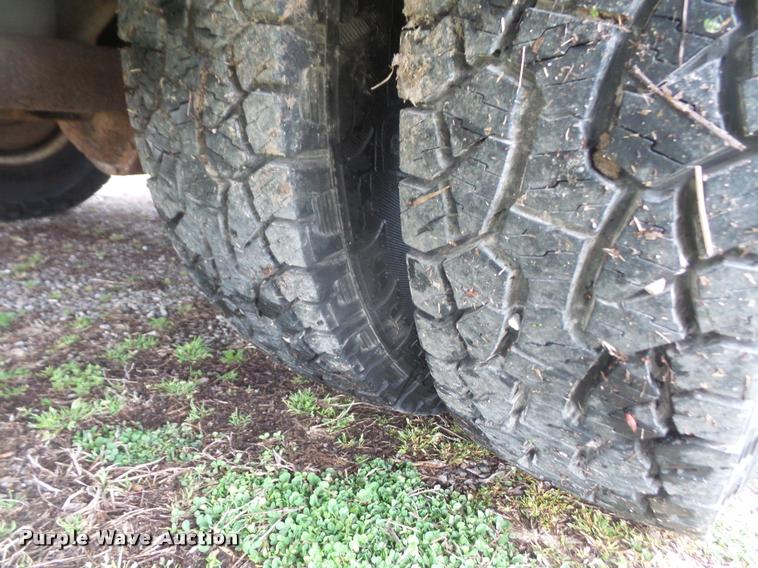 image for item DB0603 2004 Ford F350 Super Duty flatbed pickup truck