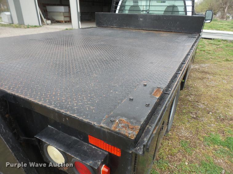 image for item DB0603 2004 Ford F350 Super Duty flatbed pickup truck