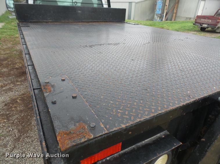 image for item DB0603 2004 Ford F350 Super Duty flatbed pickup truck