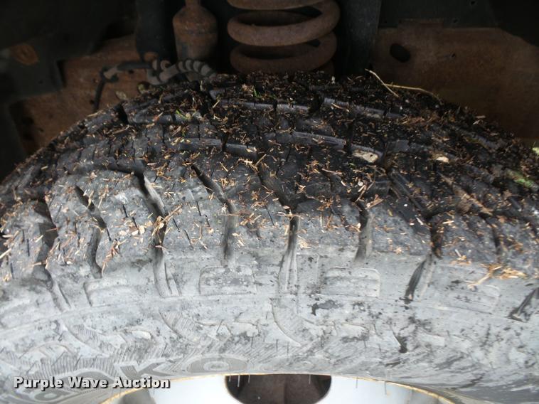 image for item DB0603 2004 Ford F350 Super Duty flatbed pickup truck