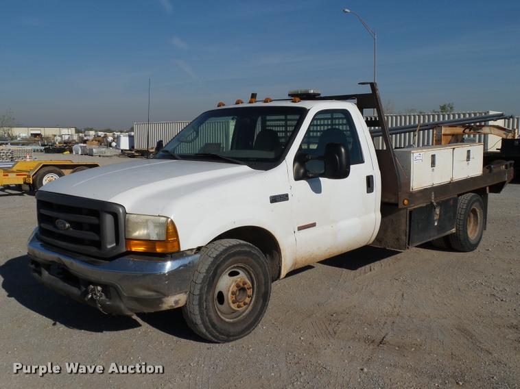 image for item DB4692 2000 Ford F350 XL Super Duty flatbed pickup truck