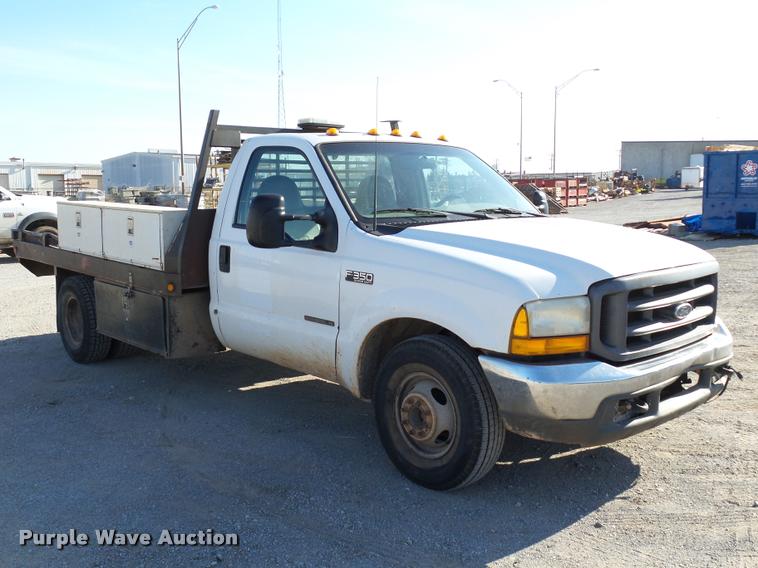 image for item DB4692 2000 Ford F350 XL Super Duty flatbed pickup truck