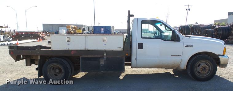 image for item DB4692 2000 Ford F350 XL Super Duty flatbed pickup truck