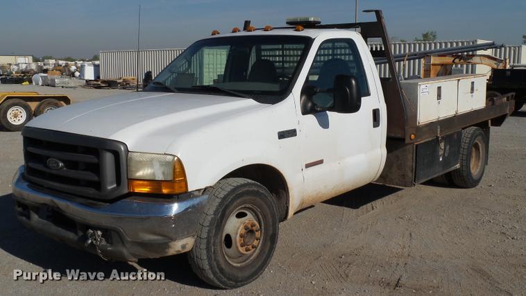 image for item DB4692 2000 Ford F350 XL Super Duty flatbed pickup truck