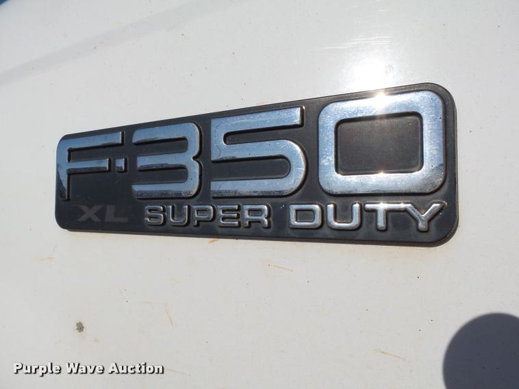 image for item DB4692 2000 Ford F350 XL Super Duty flatbed pickup truck