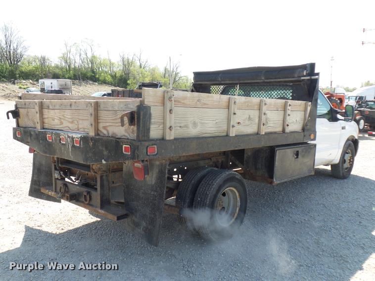 image for item DD9282 1999 Ford F350 Super Duty flatbed pickup truck