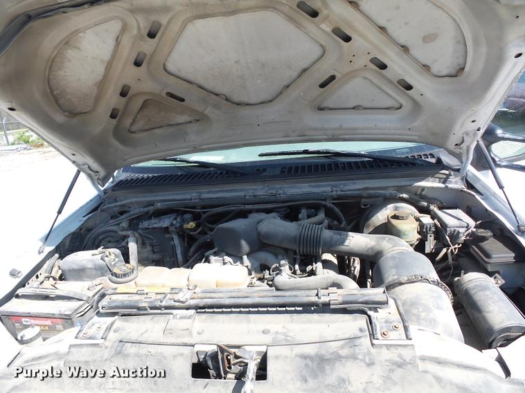 image for item DD9282 1999 Ford F350 Super Duty flatbed pickup truck