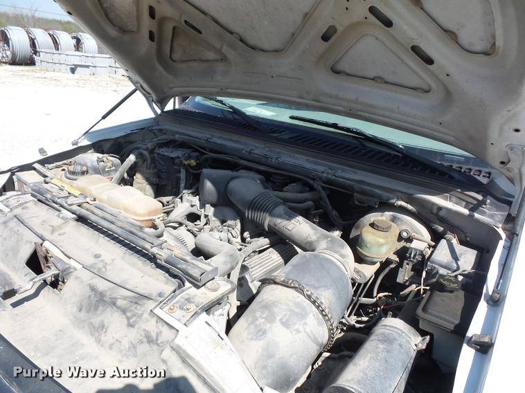 image for item DD9282 1999 Ford F350 Super Duty flatbed pickup truck