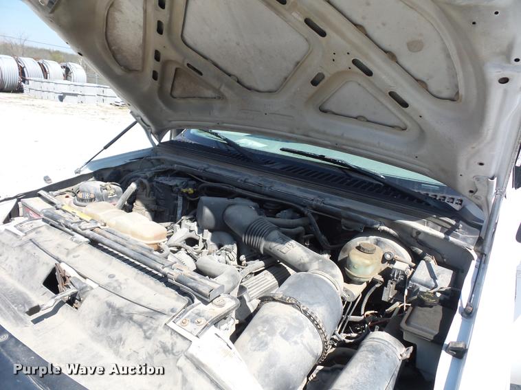 image for item DD9282 1999 Ford F350 Super Duty flatbed pickup truck