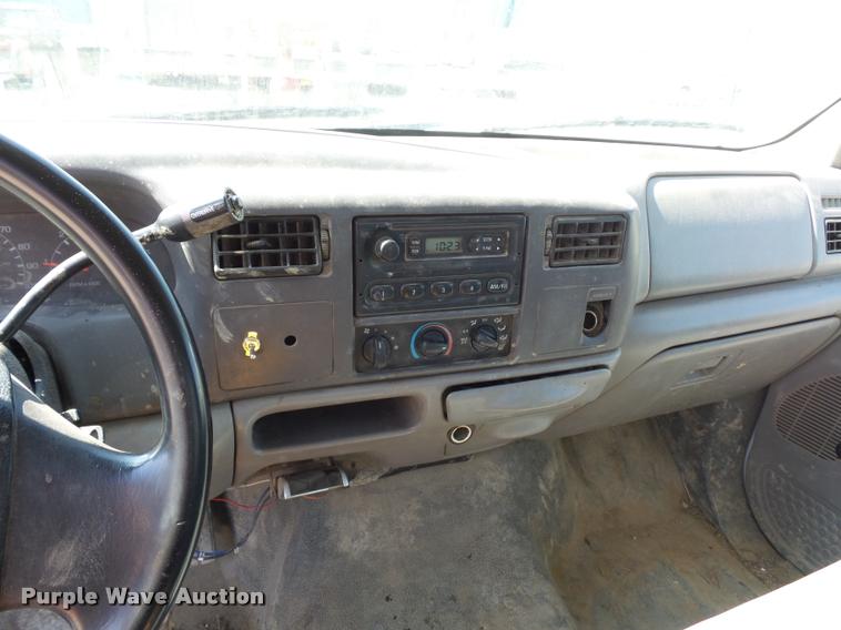 image for item DD9282 1999 Ford F350 Super Duty flatbed pickup truck