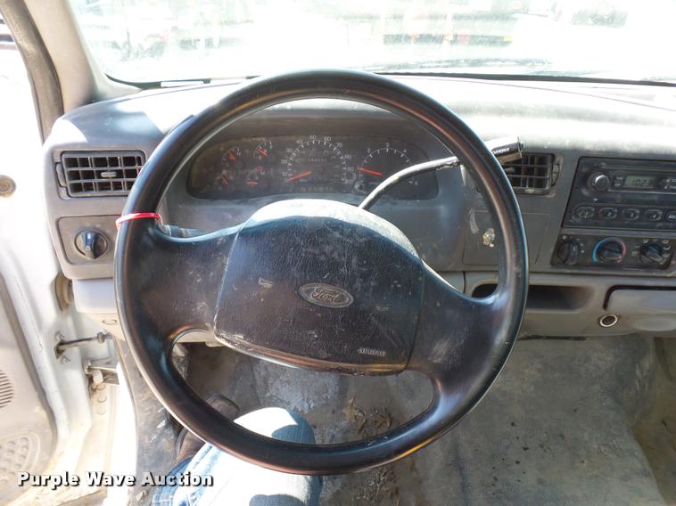 image for item DD9282 1999 Ford F350 Super Duty flatbed pickup truck