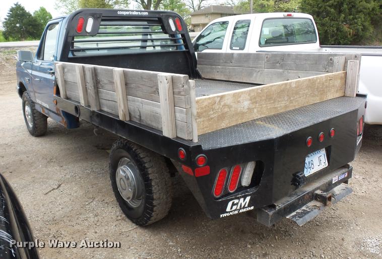 image for item DD9306 1988 Ford F250 HD flatbed pickup truck