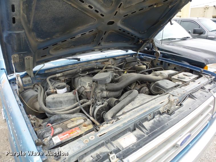 image for item DD9306 1988 Ford F250 HD flatbed pickup truck