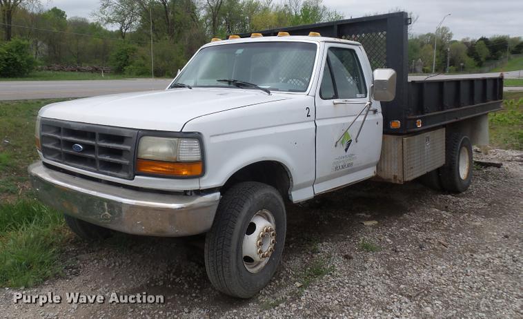 image for item DD9319 1992 Ford F450 Super Duty dump flatbed truck