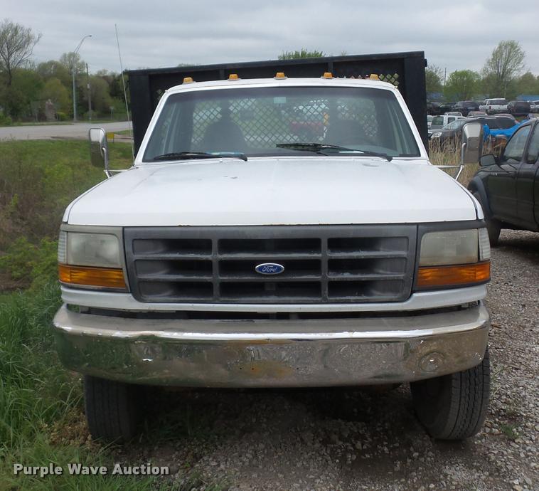 image for item DD9319 1992 Ford F450 Super Duty dump flatbed truck