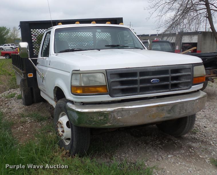 image for item DD9319 1992 Ford F450 Super Duty dump flatbed truck