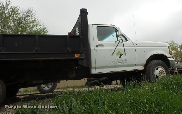 image for item DD9319 1992 Ford F450 Super Duty dump flatbed truck