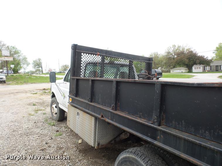 image for item DD9319 1992 Ford F450 Super Duty dump flatbed truck