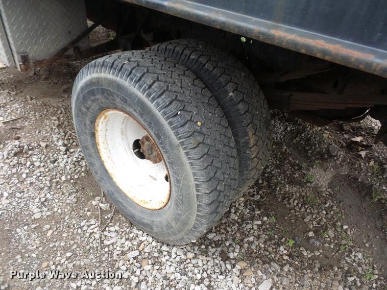 image for item DD9319 1992 Ford F450 Super Duty dump flatbed truck