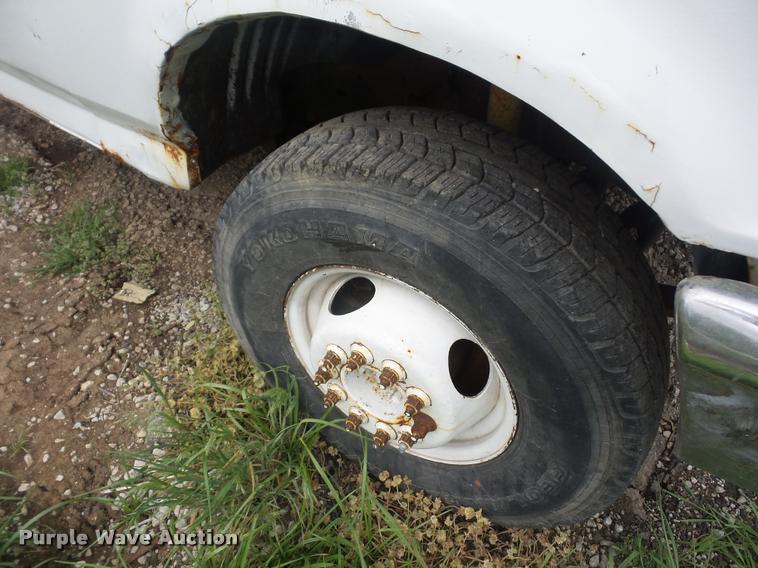 image for item DD9319 1992 Ford F450 Super Duty dump flatbed truck