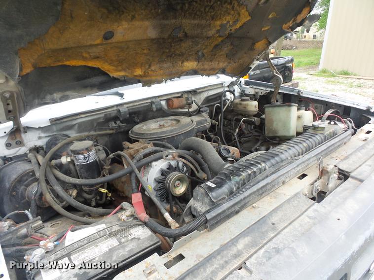image for item DD9319 1992 Ford F450 Super Duty dump flatbed truck