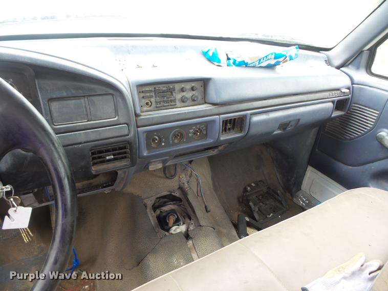 image for item DD9319 1992 Ford F450 Super Duty dump flatbed truck
