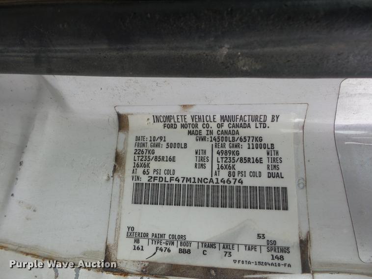 image for item DD9319 1992 Ford F450 Super Duty dump flatbed truck