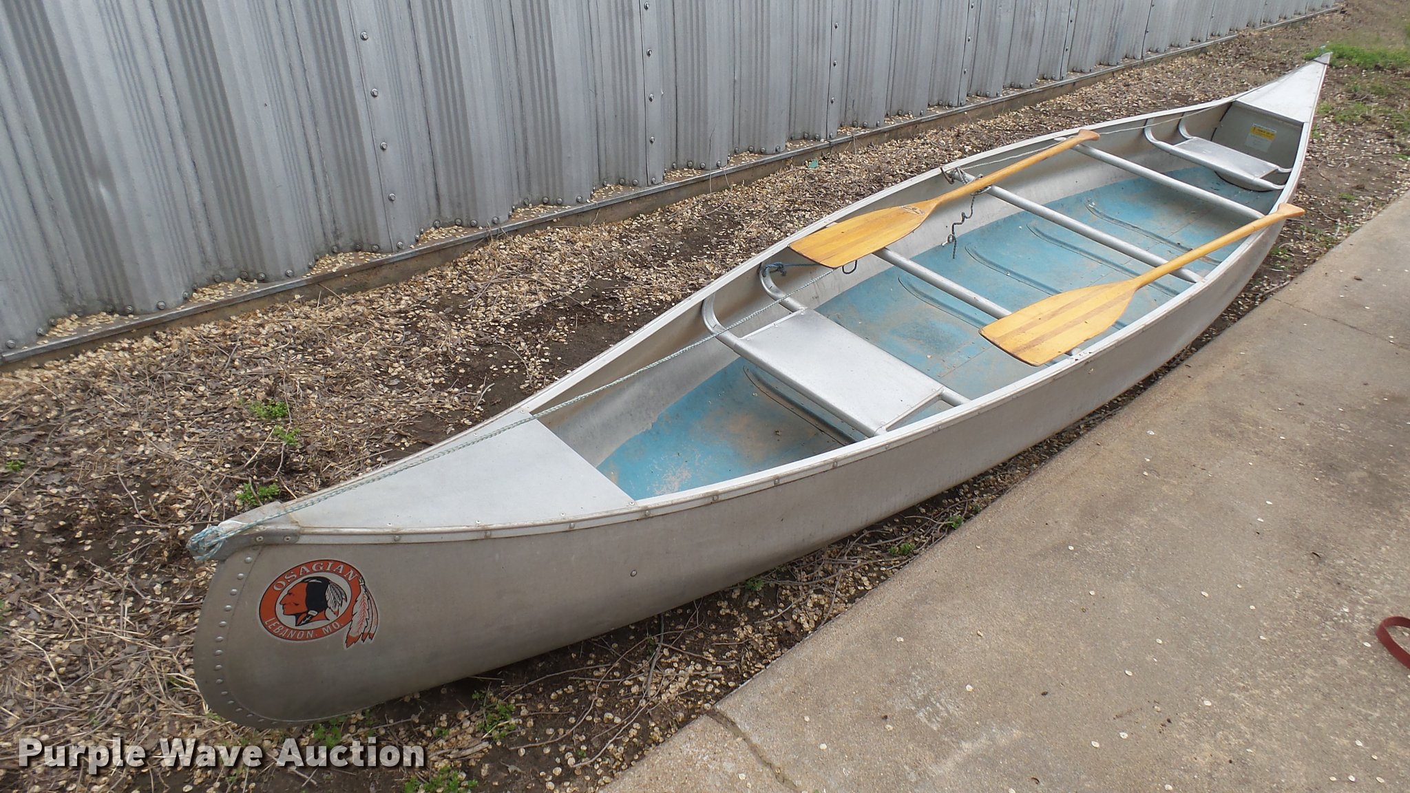 Osagian canoe in Cheney, KS Item DM9056 sold Purple Wave