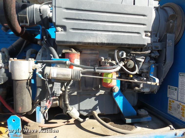 image for item L4702 2002 Genie S-65 boom lift