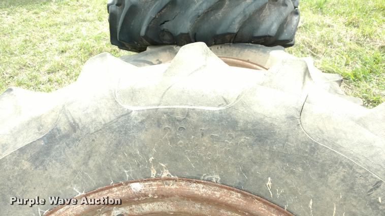 image for item DB0921 (3) 23.1-34 tires and wheels
