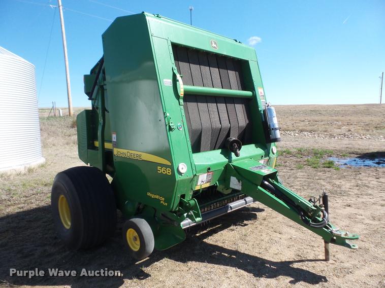 image for item F1996 2010 John Deere 568 Mega Wide Plus round baler