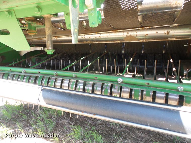 image for item F1996 2010 John Deere 568 Mega Wide Plus round baler