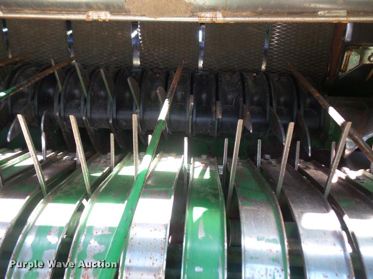 image for item F1996 2010 John Deere 568 Mega Wide Plus round baler