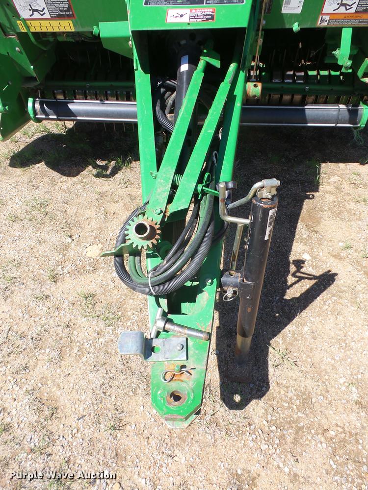 image for item F1996 2010 John Deere 568 Mega Wide Plus round baler
