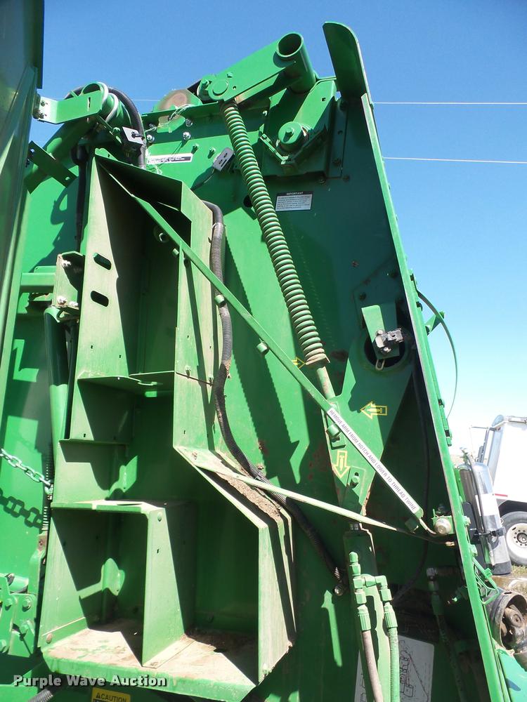 image for item F1996 2010 John Deere 568 Mega Wide Plus round baler
