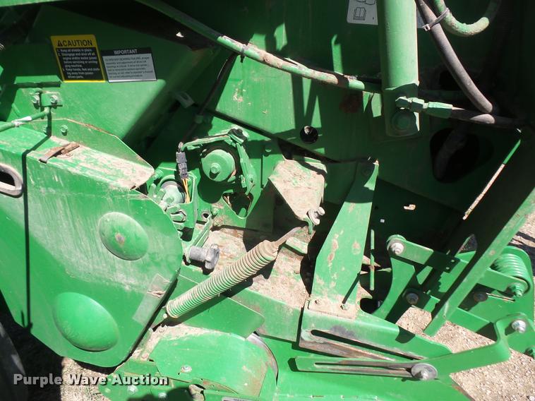 image for item F1996 2010 John Deere 568 Mega Wide Plus round baler