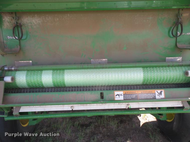 image for item F1996 2010 John Deere 568 Mega Wide Plus round baler