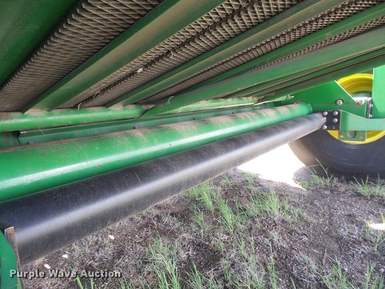 image for item F1996 2010 John Deere 568 Mega Wide Plus round baler