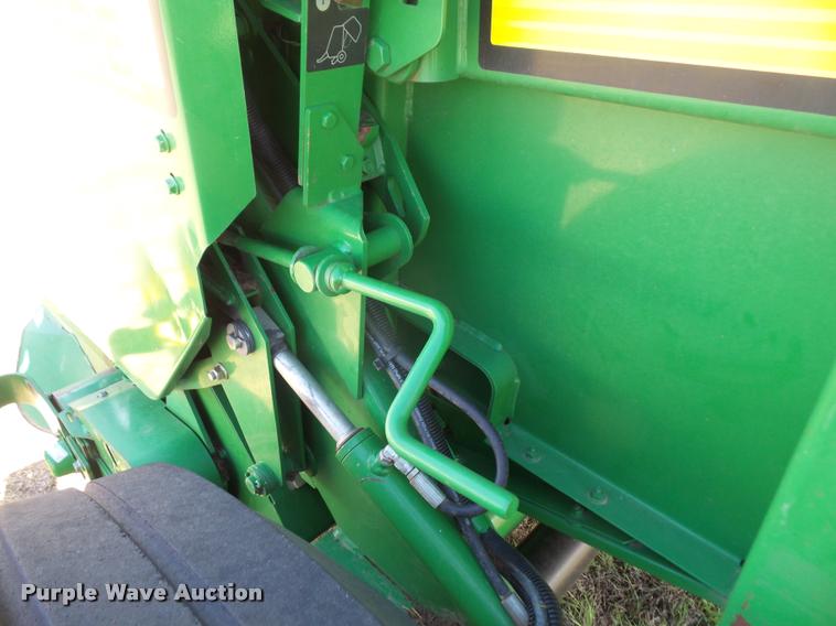 image for item F1996 2010 John Deere 568 Mega Wide Plus round baler