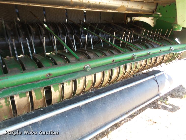 image for item F1996 2010 John Deere 568 Mega Wide Plus round baler