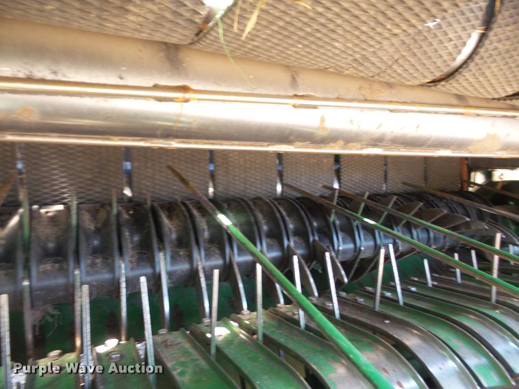 image for item F1996 2010 John Deere 568 Mega Wide Plus round baler