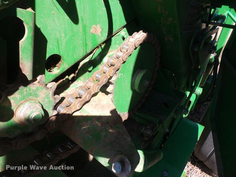 image for item F1996 2010 John Deere 568 Mega Wide Plus round baler