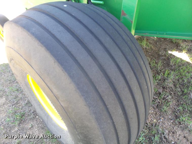 image for item F1996 2010 John Deere 568 Mega Wide Plus round baler