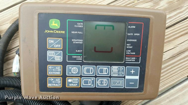 image for item F1996 2010 John Deere 568 Mega Wide Plus round baler