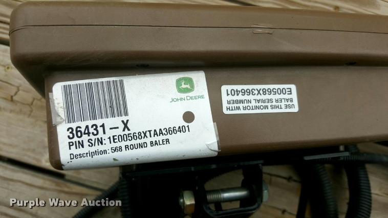 image for item F1996 2010 John Deere 568 Mega Wide Plus round baler